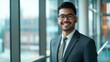 © gn8 - Confident Businessman in Modern Office Setting - Professional Portrait, Corporate Attire, Natural Light
