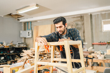 Wall Mural - carpenter workshop with timber equipment and carpenter's shop tool, craft woodwork industry by professional craftsman person working in wooden occupation job to make a furniture from wood plank