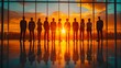 © Thanaphon - Corporate Silhouettes Gazing into the Vibrant Sunset Horizon