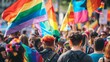 © Photo Ground - Large crowd gathered at a pride rally with vibrant signage and banners