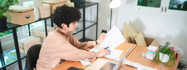 Late-night freelancer, Dedicated Asian woman working overtime on laptop computer, meeting deadlines in the sleepy Night, Businesswoman burning the midnight to working hard, sleep at working desk