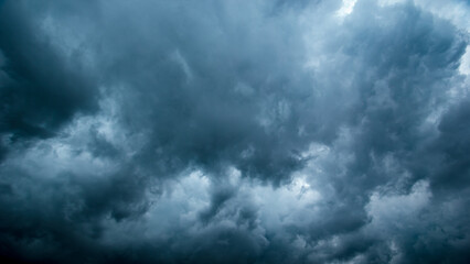 Aufkleber - Bad or moody weather sky and environment. climate change. carbon dioxide emissions, greenhouse effect, global warming.The dark sky with heavy clouds converging and a violent storm before the rain.