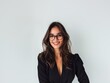 © Restyler - Stylish young brunette woman smiling on a white background. Beauty and fashion. Style.