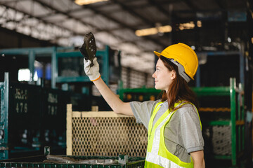 Wall Mural - engineer or worker person team working in factory warehouse, man, manufacturing industry business distribution storage by teamwork of logistic occupation job, woman or man manager work with safety