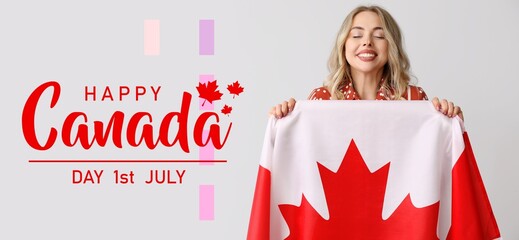 Canvas Print - Happy young woman with Canadian flag on light background. Banner for Canada Day