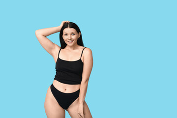 Sticker - Body positive young woman on blue background