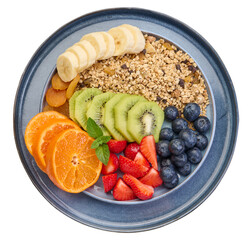 Wall Mural - Granola with strawberries, kiwi, banana and blueberries in a round plate