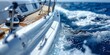 © aicandy - A close-up view of the side of a sailing yacht cutting through the deep blue ocean waves with the sun shining brightly and the horizon in sight