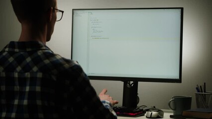 Information technology, IT business. Programmer developing new application. Digital software, mobile app development. Man specialist coding, computer screen close-up. Web design.
