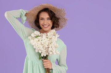 Poster - Beautiful young woman with bouquet of blooming white lilac flowers on color background