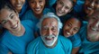 © ArtCookStudio - Smiling Group of People in Blue Shirts