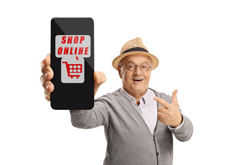 Wall Mural - Elderly gentleman pointing at a smartphone isolated on white background