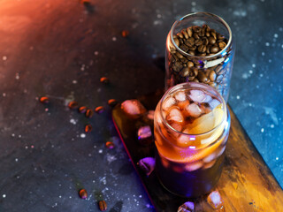 Wall Mural - refreshing iced coffee with lemon. top view cold brew coffee glass
