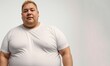 © BlackBird Studio - Fat man in T-shirt on light background