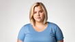 © BlackBird Studio - Chubby blonde woman on a light isolated background