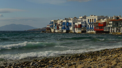 Wall Mural - Colorful buildings along the ocean in Mykonos, Greece