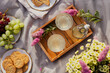 © The Picture Pantry - Outdoor summer picnic with cloudy lemonade, cookies and grapes on a blanket
