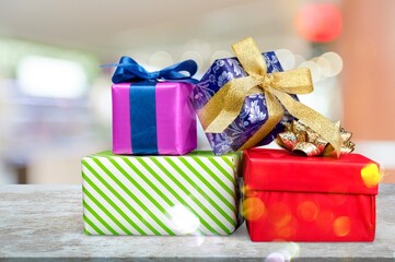 Poster - Stack of beautiful colored gifts with bow