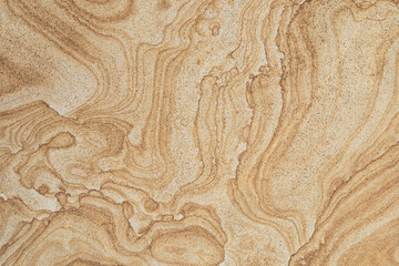 swirled sandstone surface close-up