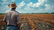 © Sang - A farmer looking out over a drought-ridden, barren field conceptual illustration of the challenges faced by agriculture due to changing climate conditions.