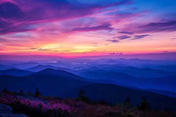 Wall Mural - Vibrant Sunset Over Layered Mountain Ridges