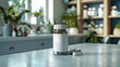 © nuengneng - Blank mockup of a pill bottle, plain white label, on a countertop with a background of various medical supplies