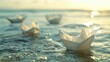 © DenisNata - Image of paper boats adrift on gentle sea waves.