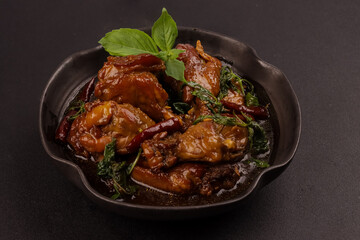 Canvas Print - Three Cup Chicken or San Bae Ji is Braised Chicken in a Sweet and Savory Broth  with Thai Basil. 