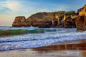 Wall Mural - Waves at Praia dos Estudantes beach in Lagos, Algarve, Portugal. 