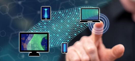 Wall Mural - man touching a device connection concept