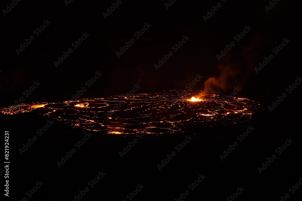 Stunning image of a volcanic eruption with a contrasting black and ...