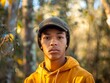 © Balaraw - young man in yellow hoodie in forest