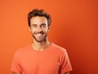 © Zickert - Coral background Happy european white man realistic person portrait of young beautiful Smiling man good mood Isolated on Background Banner with copyspace blank