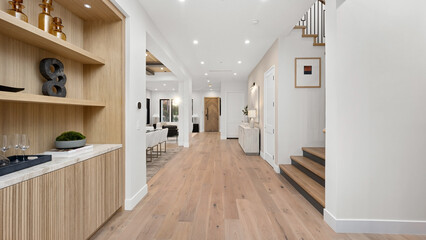 Hall with a staircase leading to the second floor of a home