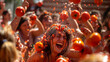 © tiagozr - People enjoying La Tomatina festival with tomatoes thrown everywhere.