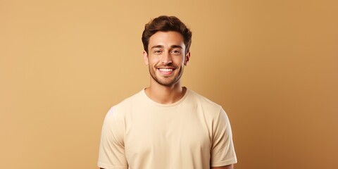 Wall Mural - Beige background Happy european white man realistic person portrait of young beautiful Smiling man good mood Isolated on Background Banner with copyspace 