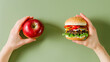 © Mutshino_Artwork - Hands holding an apple and a burger, representing a healthy and unhealthy food choice