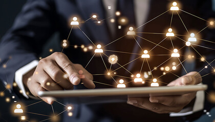 Leinwandbilder - A businessman working on a digital tablet with a virtual overlay of interconnected customer icons and lines, representing CRM, human resources management, and global communication