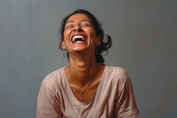 Wall Mural - Portrait of a joyful indian woman in her 40s laughing in plain white digital canvas