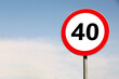 © New Africa - Road sign Maximum speed limit against blue sky