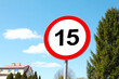 © New Africa - Road sign Maximum speed limit against blue sky