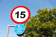 © New Africa - Road signs Maximum speed limit and Shared cycle and pedestrian path outdoors
