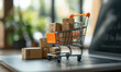 © ValNik Creations - Shopping online. Boxes in cart on laptop keyboard. Ideas about online shopping. An e-commerce concept that allows consumers to directly purchase products from a retailer over the Internet.