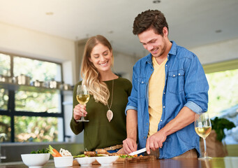 Wall Mural - Vegetables, chopping and couple with knife, kitchen counter and cooking for dinner on wood board. House, champion and people with smile for nutrition, woman and man with meal prep of healthy food