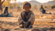 © Свет Лана - Portrait of a poor African child sitting on the floor in poverty.
