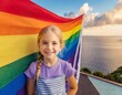 © Arthur - happy smiling girl stands against the background of the lgbt flag, queer pride month, the future of children, a world without bullying and discrimination, the fight for equal rights