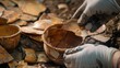 © klss777 - Historians piece together pottery fragments to reveal stories of ancient cultures, daily life, and societies.
