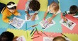 © peopleimages.com - Children, group and drawing for creative learning in classroom for education, project or back to school. Boys, girls and friends on floor mat for student art lesson or Montessori, youth or playing