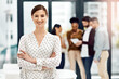 © peopleimages.com - Arms crossed, leadership and portrait of business woman in office for creative or design occupation. Management, meeting and smile of confident employee in workplace boardroom for project management