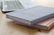 © Volha - notebooks with text 'think positive' on wooden table